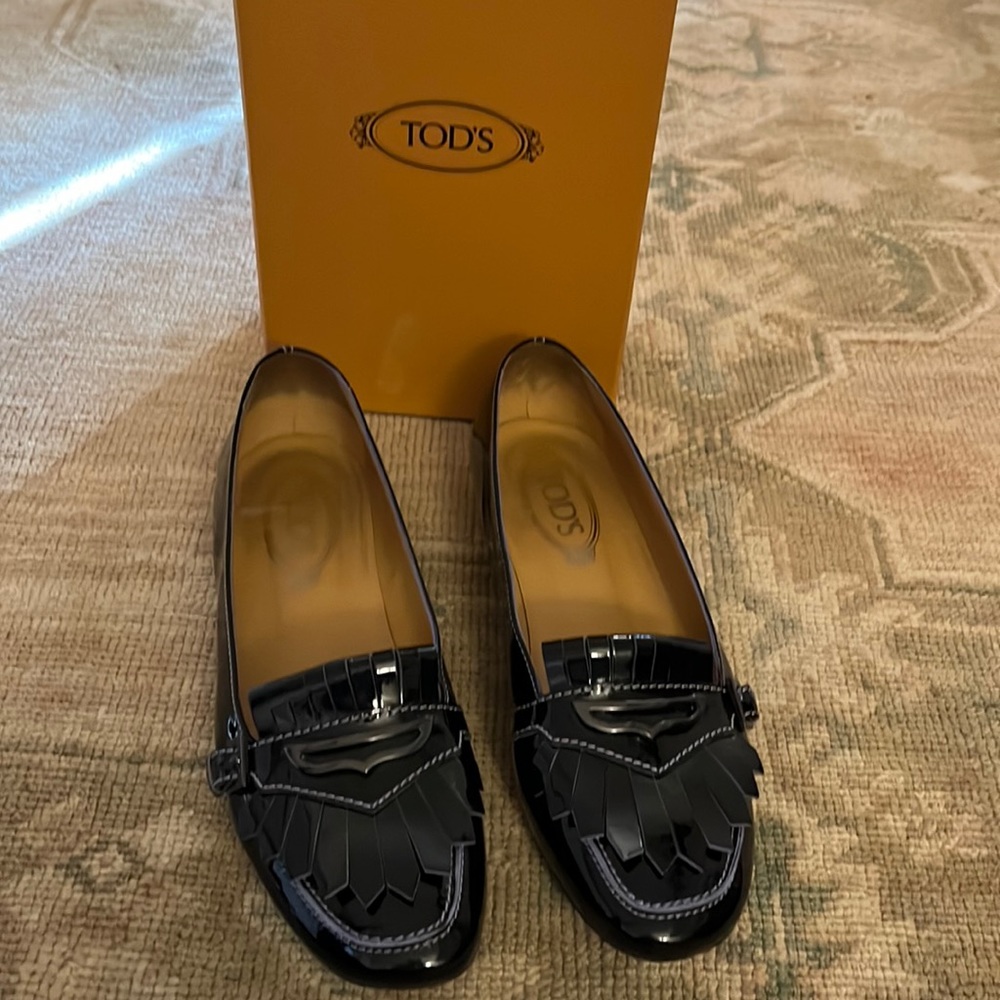 Black Patent Tod’s loafer size 39.  In wonderful condition!